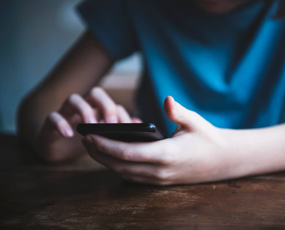 Young person using smartphone